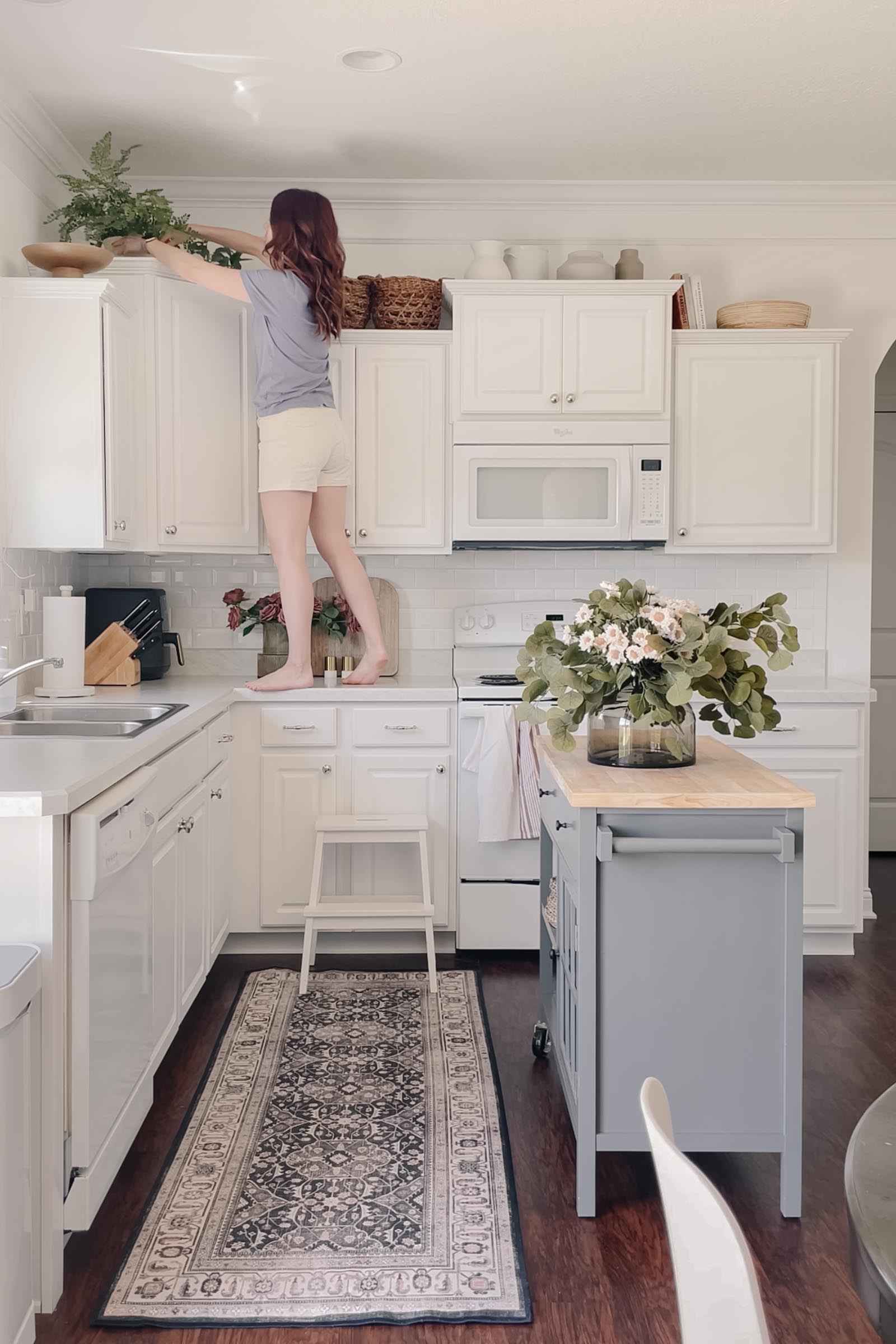 How to Decorate Space above Kitchen Cabinets