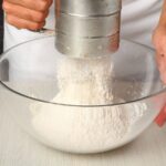How to Sift Flour With a Sifter