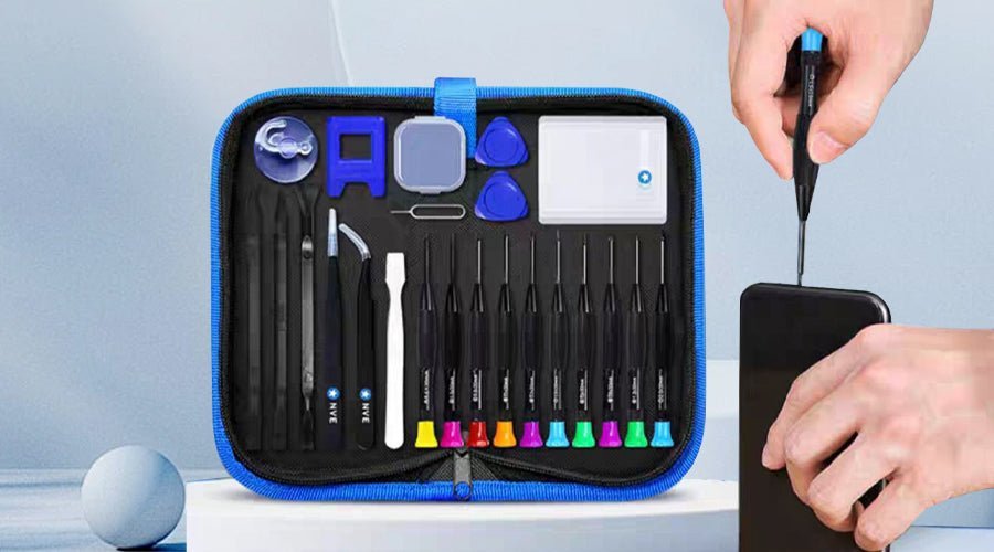 A professional computer and mobile device repair kit arranged neatly on a wooden workbench.
