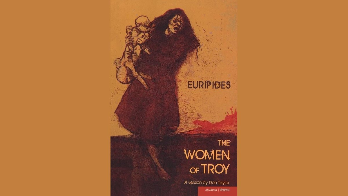 A collection of drama plays by women displayed on a sunlit wooden bookshelf.