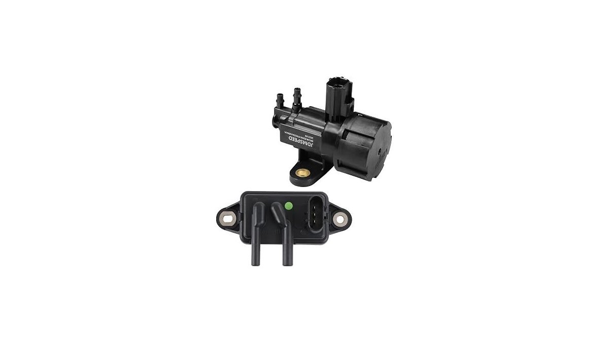 A high-quality automotive EGR valve vacuum solenoid sits on a clean workshop workbench.