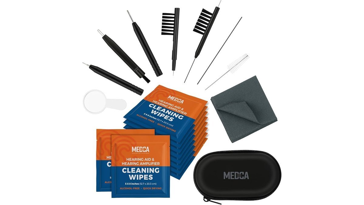 A professional hearing aid amplifier cleaning kit organized neatly on a bright surface.