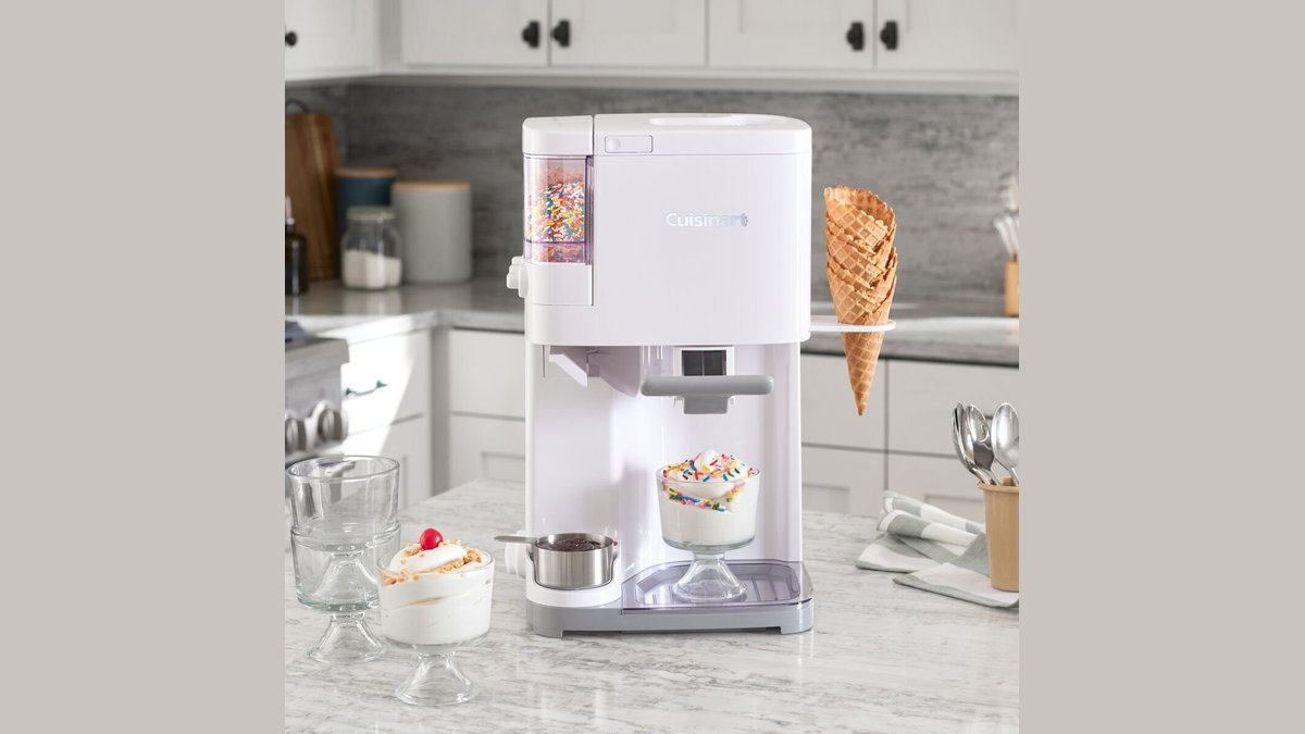A delicious vanilla soft serve ice cream cone in a bright modern kitchen.