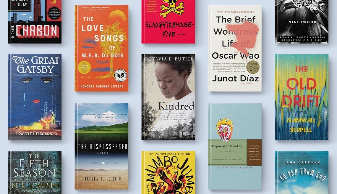 A stack of Mid-Atlantic biography books rests on a library table.