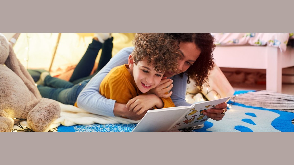 A child explores educational and inclusive special needs children's health books in a library.