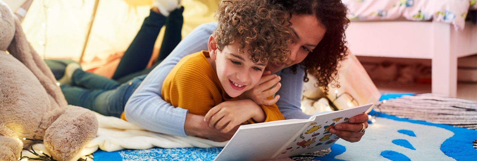 A child explores educational and inclusive special needs children's health books in a library.