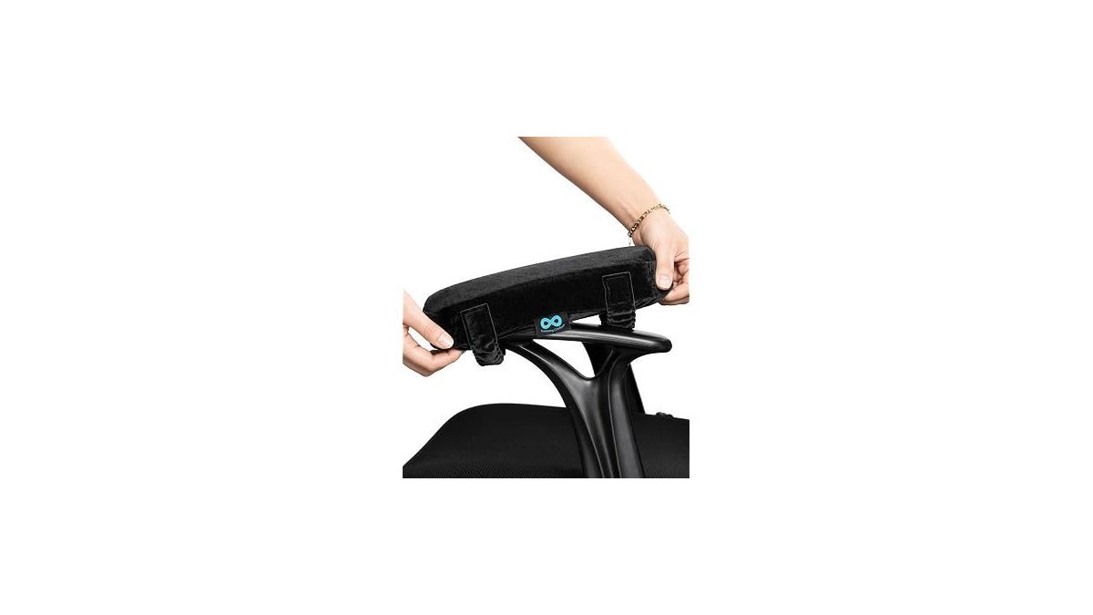 A comfortable and adjustable armrest on a modern wheelchair mobility scooter in a home.