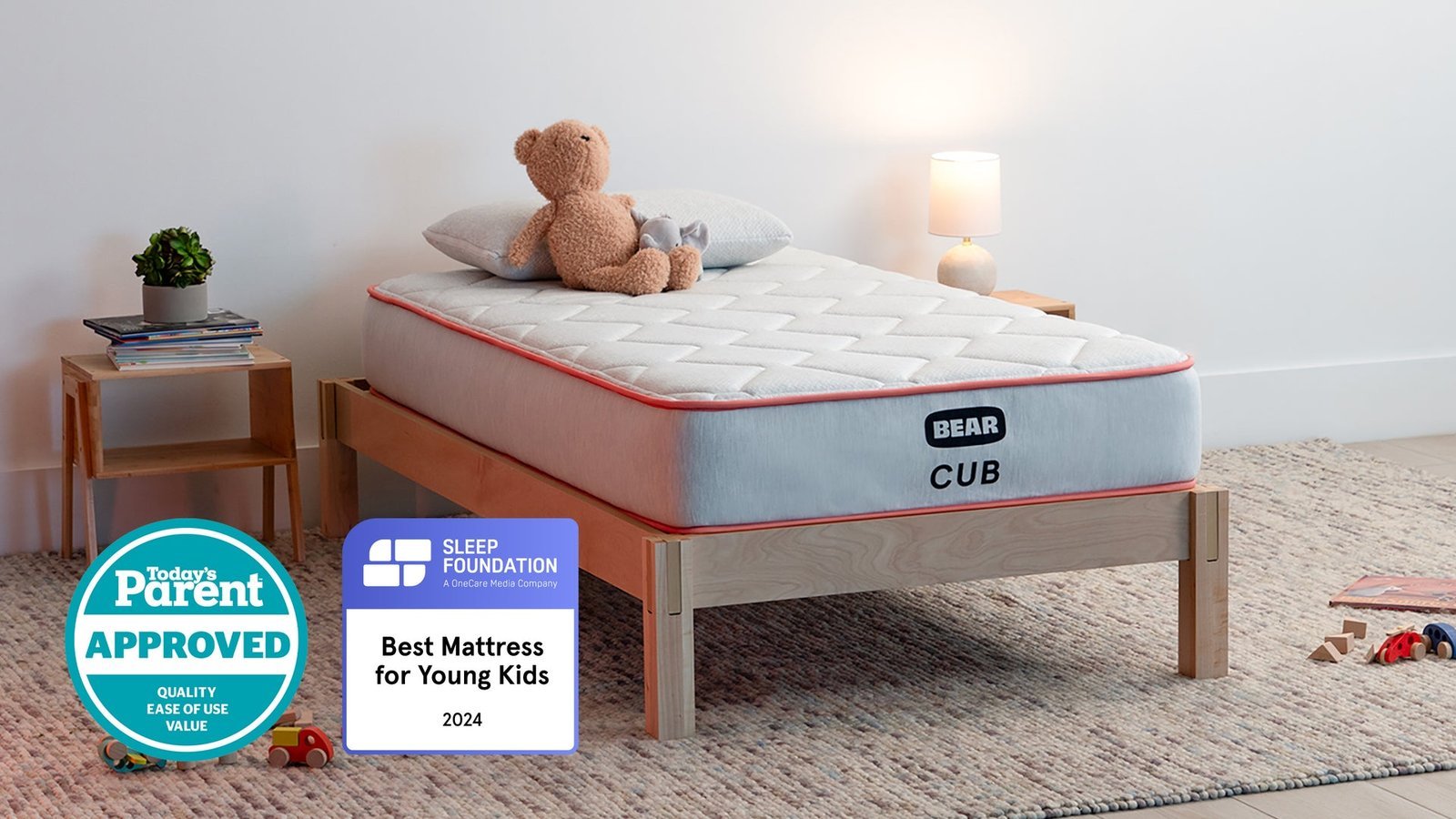 A sturdy wooden kids bed stands in a bright, modern nursery room.