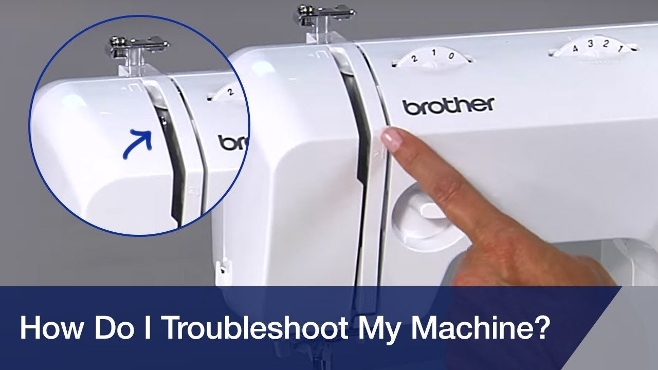 A modern Brother sewing machine ready for a project on a wooden craft table.
