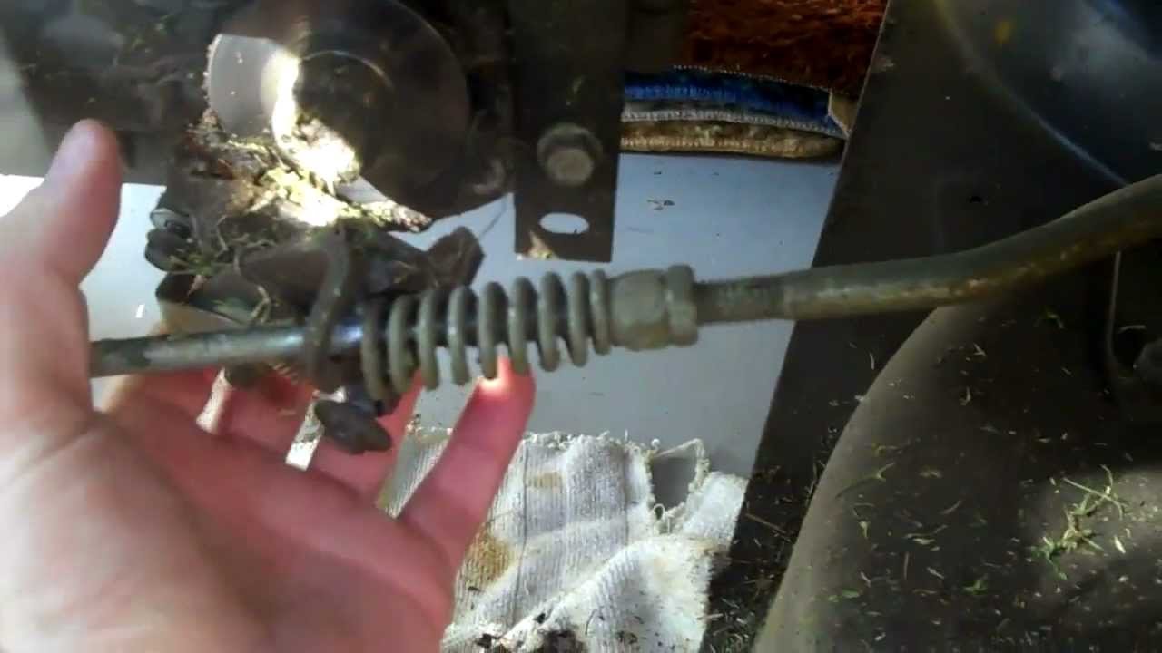 The open engine compartment of a Craftsman riding mower showing internal mechanical components.