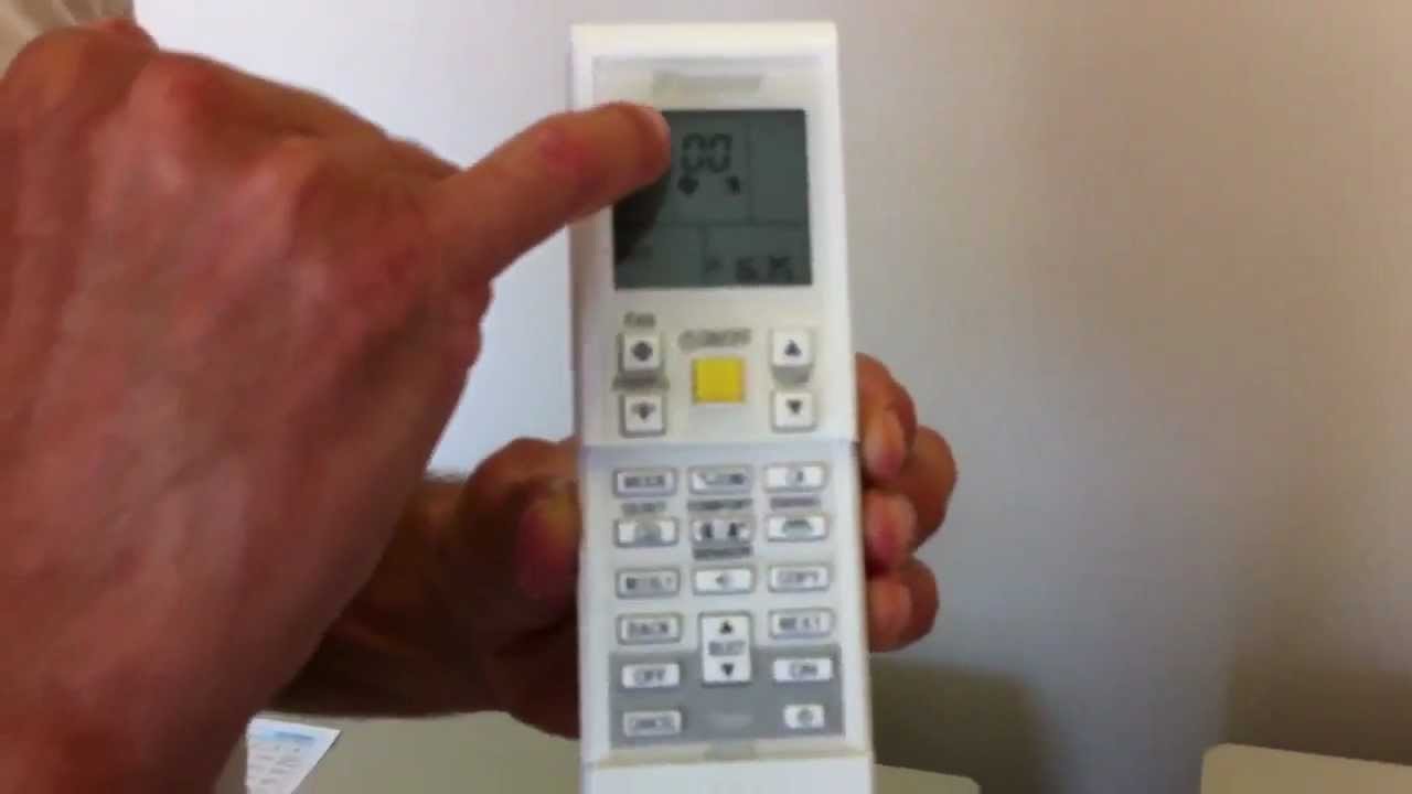 A modern Daikin air conditioner mounted on a clean white wall in a home.