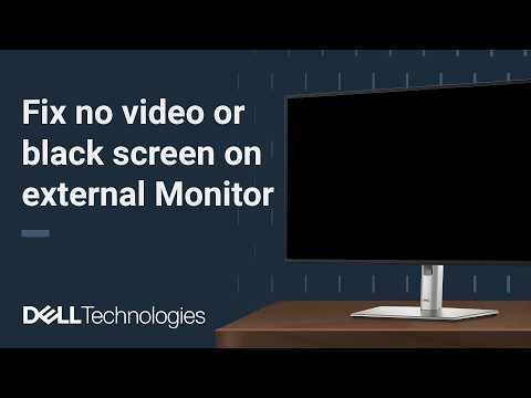 A clean desk workspace with a monitor for addressing Dell troubleshooting questions.