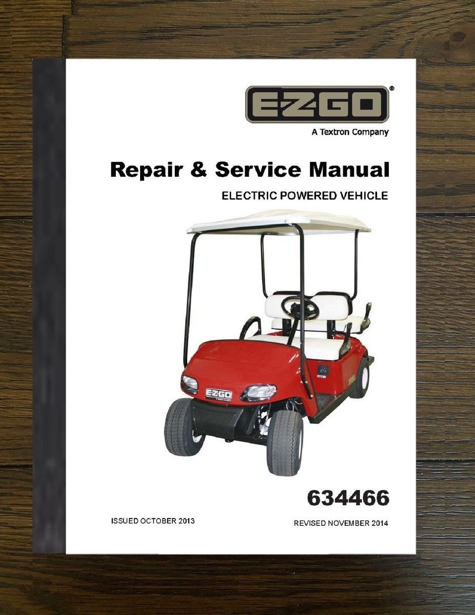 A hand switching a golf cart to tow mode to prevent battery drain.