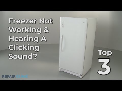 Overcrowded chest freezer interior with heavy frost buildup preventing proper air circulation.
