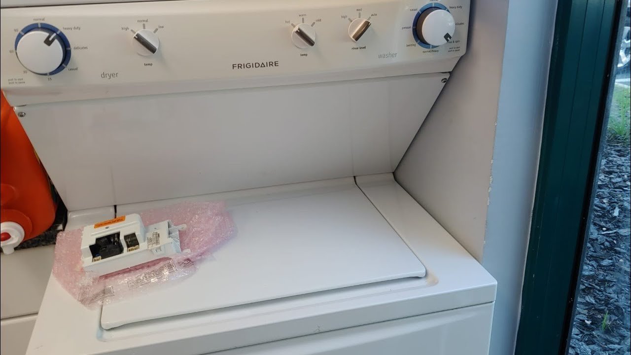 Internal electronic sensors and wiring inside a Frigidaire laundry dryer for troubleshooting purposes.