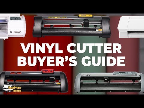 A professional Gcc Expert 24 Lx vinyl cutter sits on a clean workshop table.