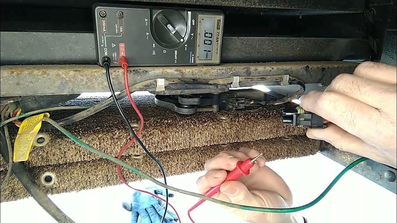 Mechanisms of a Kwikee step system on an RV during a troubleshooting inspection.