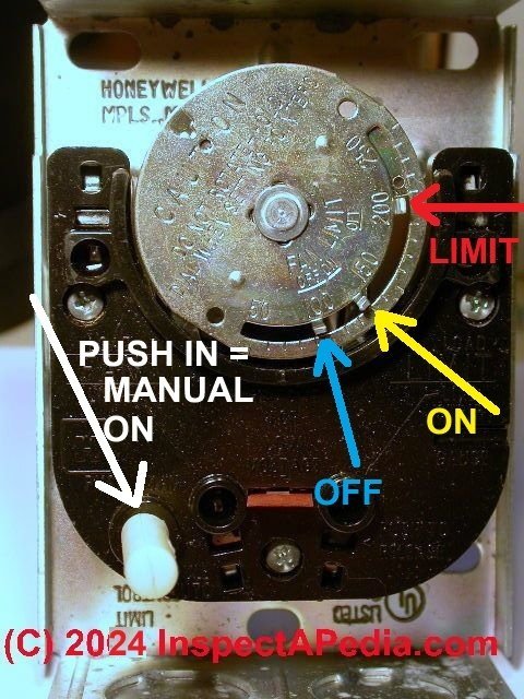 An open electrical breaker panel showing a tripped switch inside a residential home.