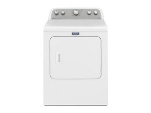 Clothes clumped unevenly inside a washing machine drum causing a balance error.