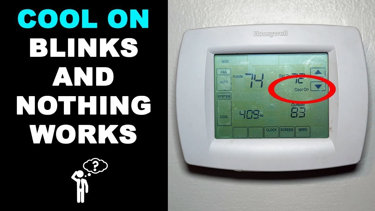 Replacing batteries inside a modern thermostat to restore electrical power.