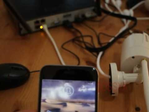 A tablet showing a connection error icon while troubleshooting a wireless security camera.
