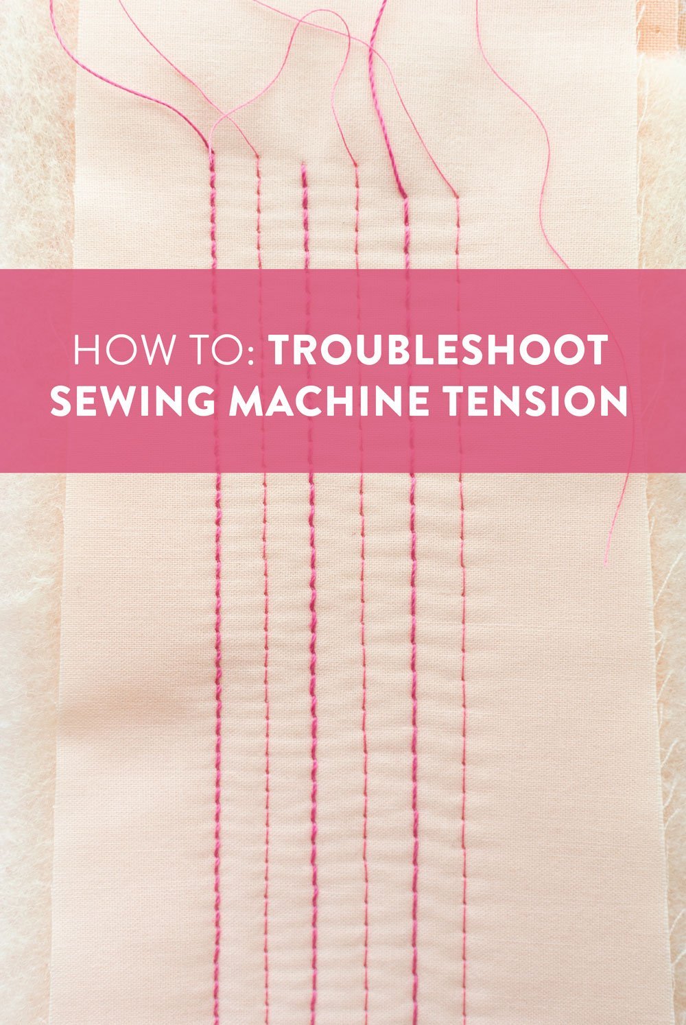 A clean and organized sewing workspace with a sewing machine ready for troubleshooting questions.