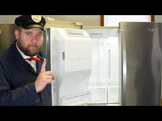 Frost buildup around the air vent inside a refrigerator freezer compartment.